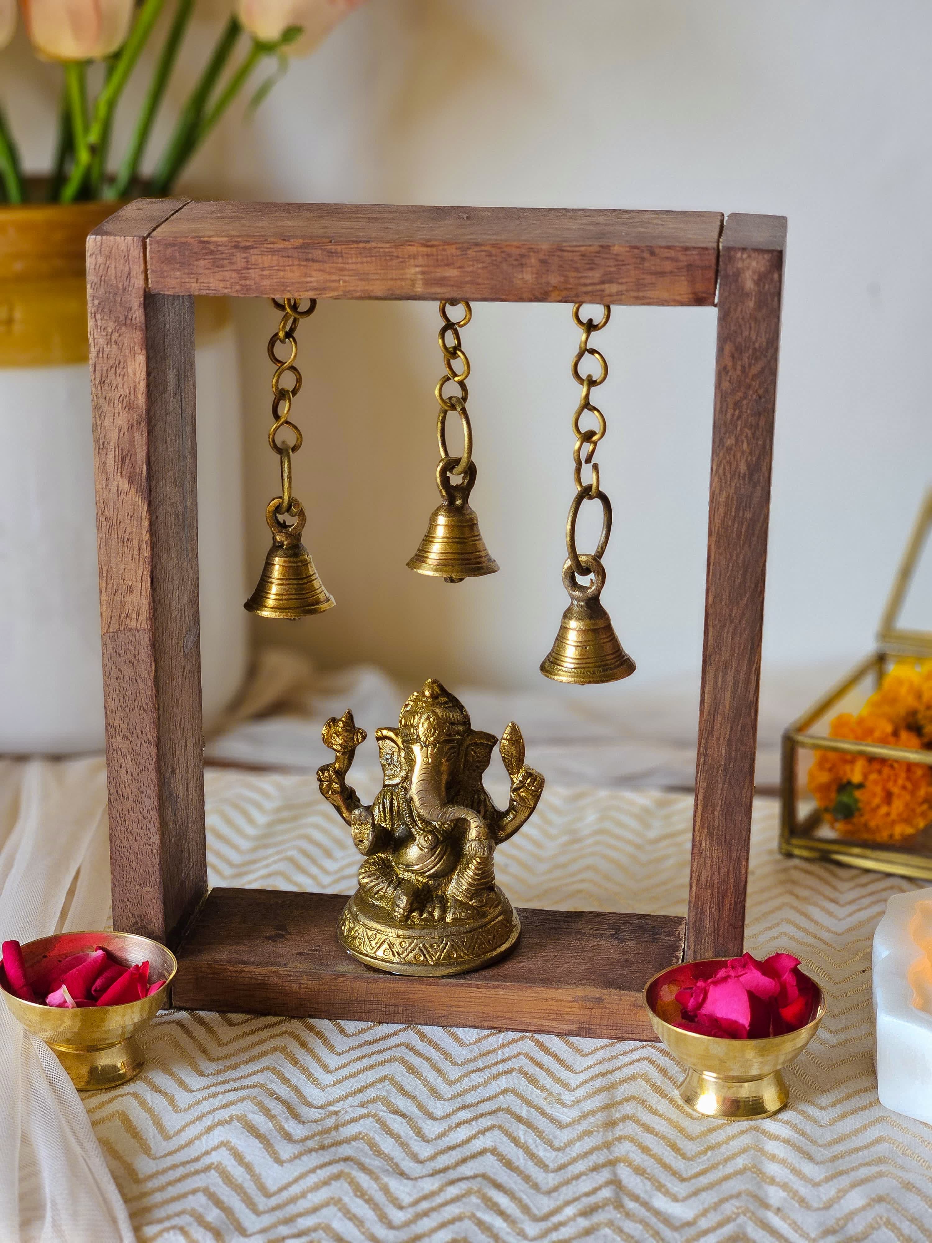 Festive Brass Ganesha Frame with Hanging Bells