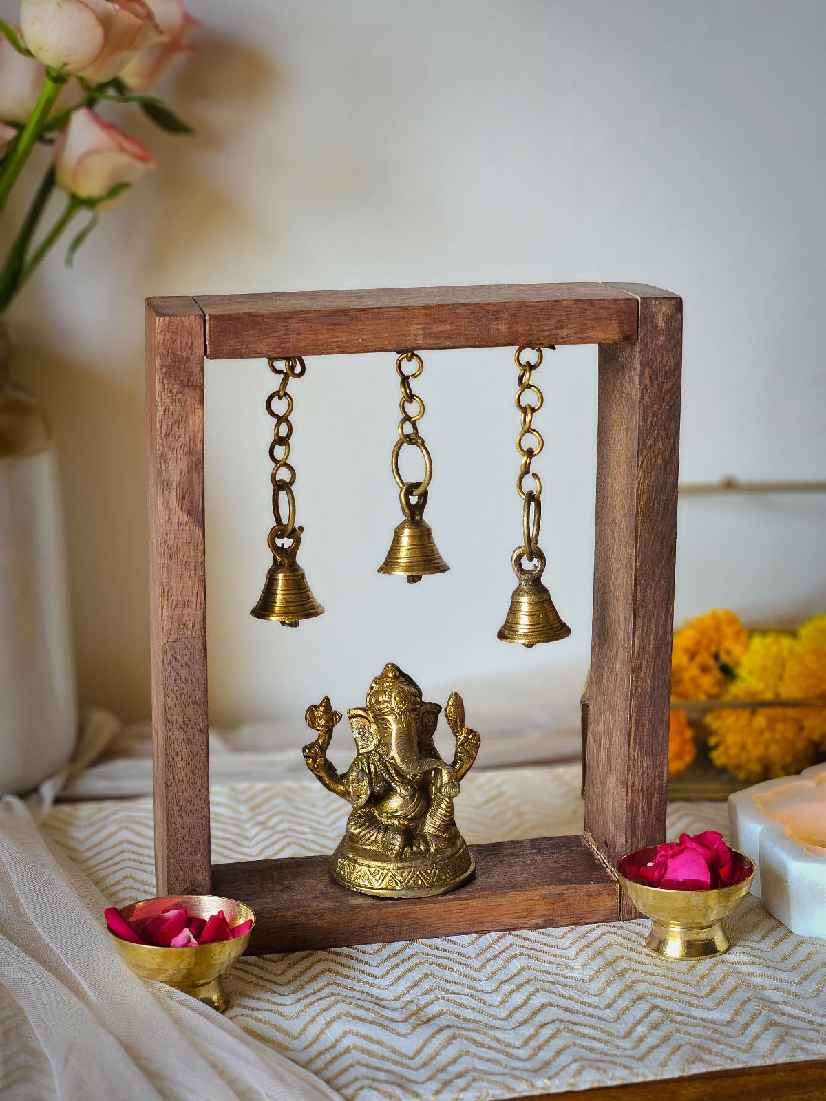 Festive Brass Ganesha Frame with Hanging Bells