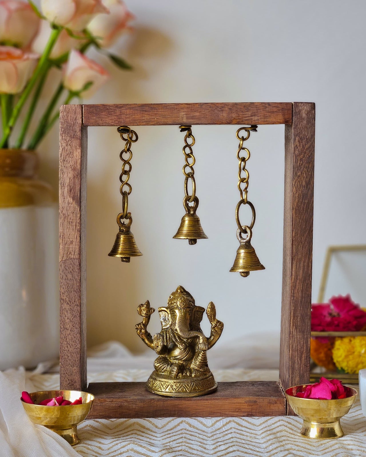 Festive Brass Ganesha Frame with Hanging Bells