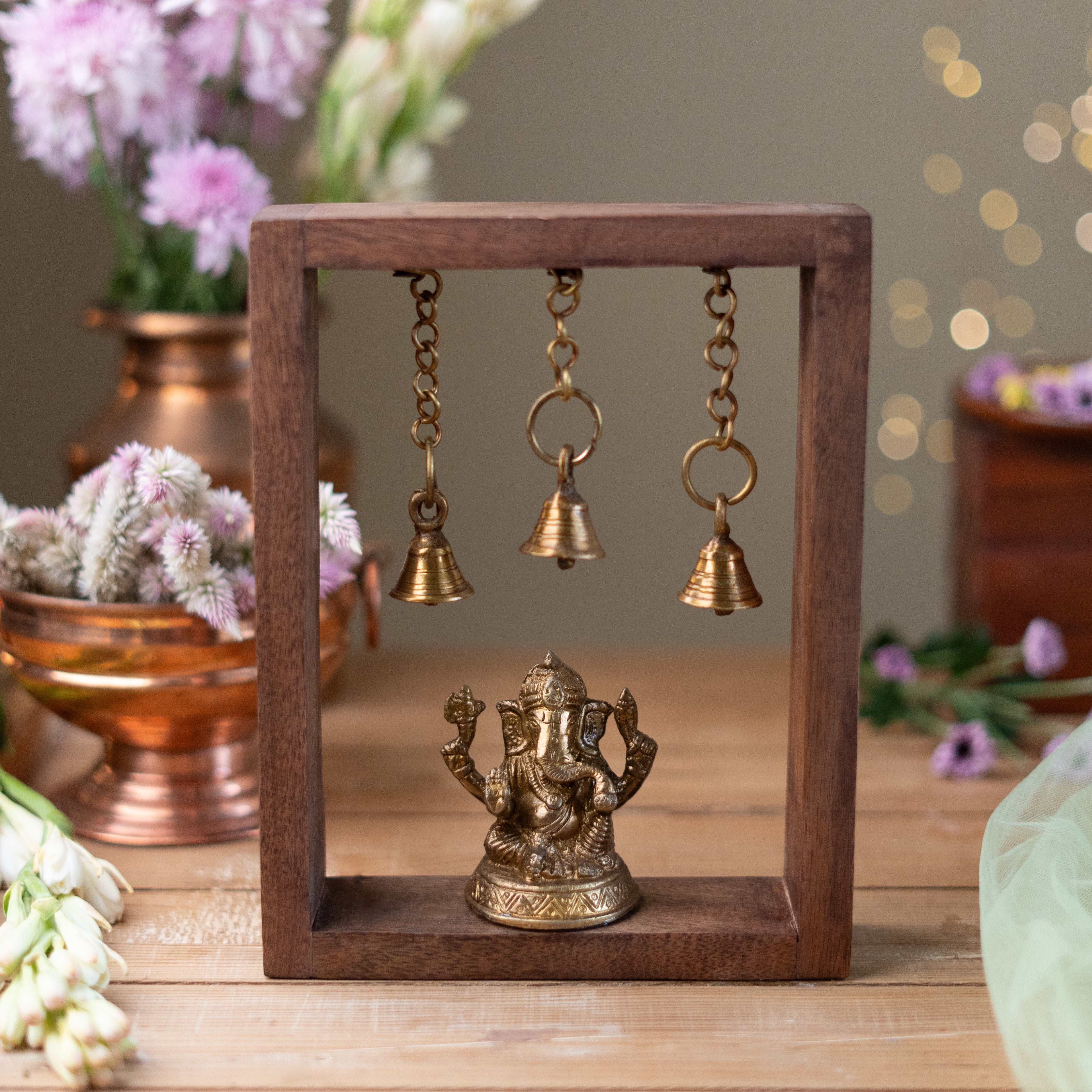 Festive Brass Ganesha Frame with Hanging Bells