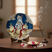 Dwarka Krishna with his Cows Kalamkari Wall plate with Wooden Stand - 8 inches
